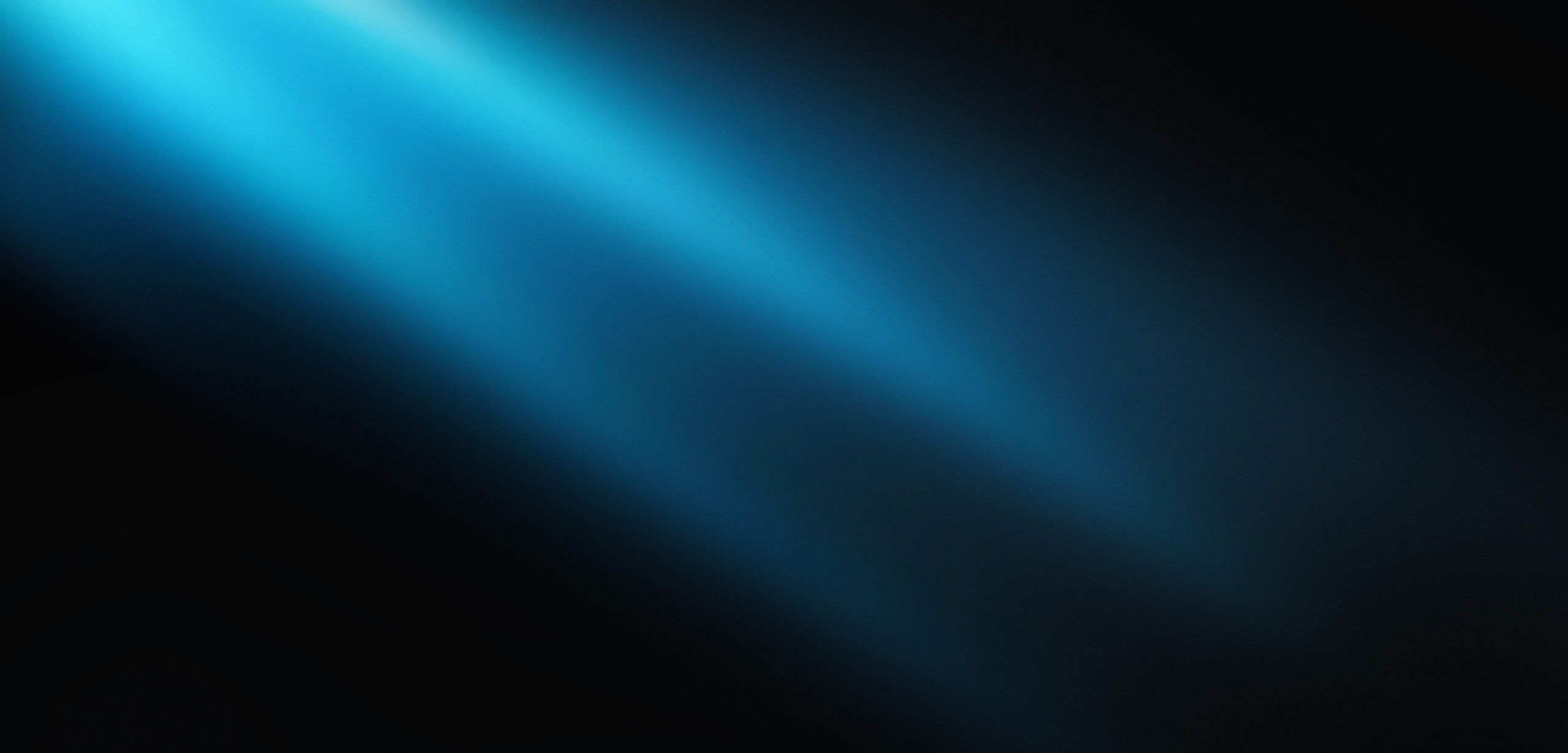 Abstrakte blaue Lichtstrahlen als Hintergrund – FUXWRK Design Engineering und CAD-Produktentwicklung in Graz